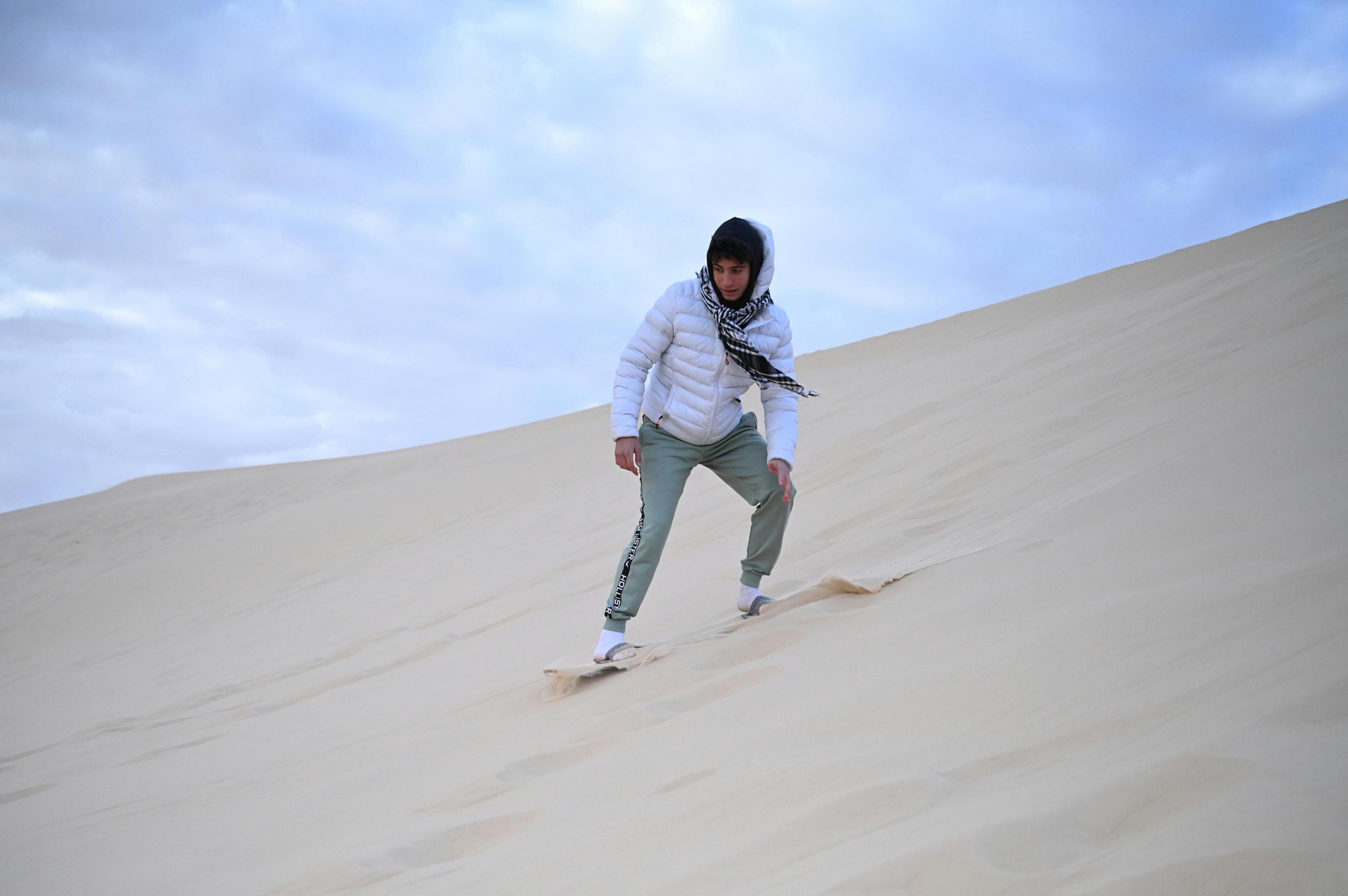 Sandboarding Merzouga | Dune Surfing in Erg Chebbi's Golden Dunes